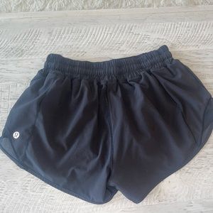 Black lululemon hotty hot LR 2.5” shorts size 4